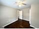 Bedroom with hardwood floors and door to another room at 2284 Headland Dr, East Point, GA 30344