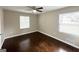 Bright bedroom with hardwood floors and two windows at 2284 Headland Dr, East Point, GA 30344