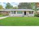 Updated ranch home with a well-manicured lawn at 2284 Headland Dr, East Point, GA 30344