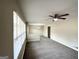 Spacious living room with neutral walls and carpet at 2284 Headland Dr, East Point, GA 30344