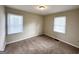 Spacious bedroom with neutral walls and plush carpeting at 490 Woods Dr, Atlanta, GA 30318
