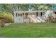Updated Ranch home with new paint, steps, and landscaping at 490 Woods Dr, Atlanta, GA 30318