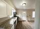 Modern kitchen with granite counters and stainless steel appliances at 490 Woods Dr, Atlanta, GA 30318