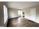Bright living room with hardwood floors and view of kitchen at 490 Woods Dr, Atlanta, GA 30318