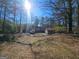 Large backyard with detached garage at 1617 Corona Dr, Austell, GA 30168