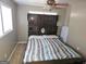 Main bedroom with large bed and sitting area at 1617 Corona Dr, Austell, GA 30168
