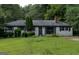 Ranch style home with a large yard at 1617 Corona Dr, Austell, GA 30168