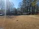 House with a large yard and driveway at 1617 Corona Dr, Austell, GA 30168