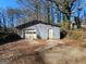 Detached garage with storage space at 1617 Corona Dr, Austell, GA 30168