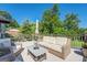 Spacious deck featuring a sofa, chairs, and a view of the yard at 260 Lawrenceville St, Mcdonough, GA 30253