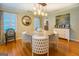 Charming dining room featuring a round table and pendant lighting at 260 Lawrenceville St, Mcdonough, GA 30253
