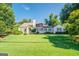 Charming ranch home with a spacious lawn and mature trees at 260 Lawrenceville St, Mcdonough, GA 30253