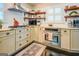 Kitchen with stainless steel appliances and light-colored cabinets at 260 Lawrenceville St, Mcdonough, GA 30253