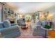 Open living room with hardwood floors and fireplace at 260 Lawrenceville St, Mcdonough, GA 30253