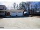 Two-car garage with ample driveway parking at 1885 Jenny Ln, Lithia Springs, GA 30122