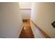 Wooden staircase leading to the lower level at 1885 Jenny Ln, Lithia Springs, GA 30122