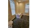 Spacious bathroom featuring a jacuzzi tub and large windows at 2001 Merle Cir, Decatur, GA 30032