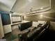 Basement home theater with projector and comfortable seating at 1828 Austins Pointe Dr, Lawrenceville, GA 30043