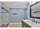 Modern bathroom features a glass shower, sleek sink, and modern accents at 90 Barrington Grange Dr, Sharpsburg, GA 30277