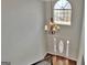 Elegant foyer with hardwood floors, grand staircase, and abundant natural light at 90 Barrington Grange Dr, Sharpsburg, GA 30277