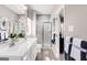 Elegant bathroom boasts double vanity, walk-in shower, and modern fixtures at 2070 Fortuna St, Lawrenceville, GA 30046