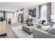 Open-concept living space with a view into kitchen, providing an ideal layout for entertaining at 2070 Fortuna St, Lawrenceville, GA 30046
