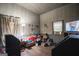 Living room with couch, TV, and assorted furniture at 613 Mc Donald Se St, Atlanta, GA 30312