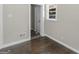 Bedroom featuring hardwood floors, white trim, and a neutral wall color at 1088 Lloyd Dr, Forest Park, GA 30297