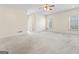 Large bedroom with ceiling fan and carpet at 168 Robson Trl, Mcdonough, GA 30252
