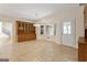 Formal dining area with built-in hutch and view to staircase at 168 Robson Trl, Mcdonough, GA 30252