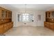 Bright dining area features built-in hutch and bay window at 168 Robson Trl, Mcdonough, GA 30252