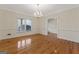 Bright dining room with hardwood floors and chandelier at 168 Robson Trl, Mcdonough, GA 30252