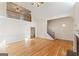 Two-story Gathering room with hardwood floors, fireplace, and high ceilings at 168 Robson Trl, Mcdonough, GA 30252