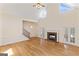 Two-story Gathering room with hardwood floors, fireplace, and high ceilings at 168 Robson Trl, Mcdonough, GA 30252