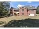 Brick house with screened porch and attached garage at 168 Robson Trl, Mcdonough, GA 30252