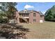 Brick house with screened porch and attached garage at 168 Robson Trl, Mcdonough, GA 30252