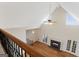 High ceiling living room with hardwood floors at 168 Robson Trl, Mcdonough, GA 30252