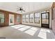 Relaxing screened porch with brick walls and deck access at 168 Robson Trl, Mcdonough, GA 30252