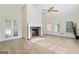 Sunroom features a brick fireplace and French doors at 168 Robson Trl, Mcdonough, GA 30252