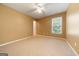 Cozy bedroom with ceiling fan and neutral decor at 308 Bell Isle, Mcdonough, GA 30252