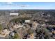 Aerial view showcasing a home's location in Lawrenceville, GA, near GA-20 and Coolray Field at 295 Camden Creek Ct, Lawrenceville, GA 30043