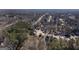 Neighborhood overview showcasing numerous homes and tree-lined streets at 295 Camden Creek Ct, Lawrenceville, GA 30043