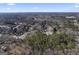 Aerial view showing a home nestled in a wooded residential neighborhood at 295 Camden Creek Ct, Lawrenceville, GA 30043