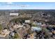 Aerial home view with pool; Lawrenceville, GA location near GA-20 and Coolray Field at 295 Camden Creek Ct, Lawrenceville, GA 30043
