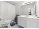 Clean bathroom with white vanity and shower/tub combo at 295 Camden Creek Ct, Lawrenceville, GA 30043