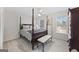 Spacious bedroom with carpeted floor and large window at 295 Camden Creek Ct, Lawrenceville, GA 30043