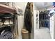 Walk-in closet with custom shelving and hanging rods at 295 Camden Creek Ct, Lawrenceville, GA 30043