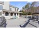 Deck overlooks the pool and provides access to the backyard at 295 Camden Creek Ct, Lawrenceville, GA 30043