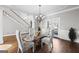 Spacious dining room with hardwood floors and chandelier at 295 Camden Creek Ct, Lawrenceville, GA 30043