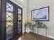 Elegant entryway with double doors and hardwood floors at 295 Camden Creek Ct, Lawrenceville, GA 30043
